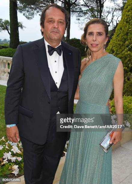 Sylvain Ercoli and Dali Feller arrive at the amfAR Gala Cannes 2017 at Hotel du Cap-Eden-Roc on May 25, 2017 in Cap d'Antibes, France.