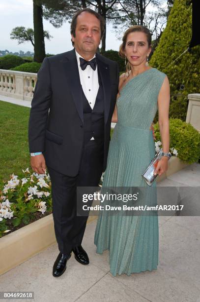Sylvain Ercoli and Dali Feller arrive at the amfAR Gala Cannes 2017 at Hotel du Cap-Eden-Roc on May 25, 2017 in Cap d'Antibes, France.