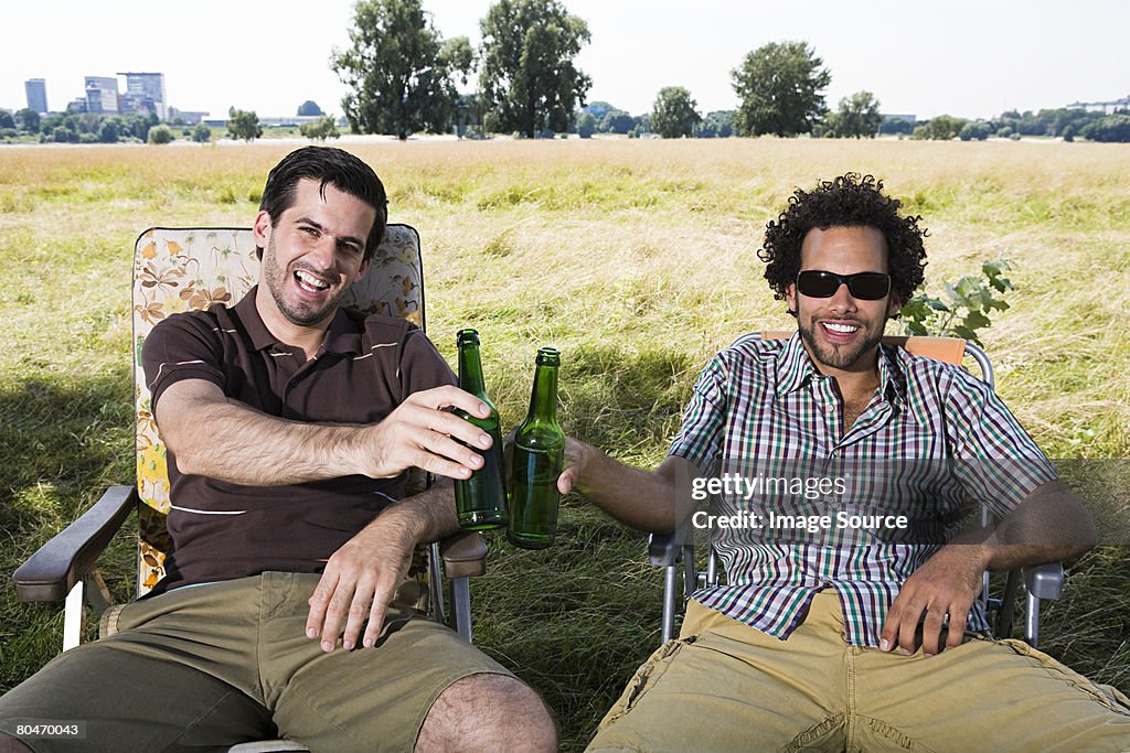 Two men drinking beer