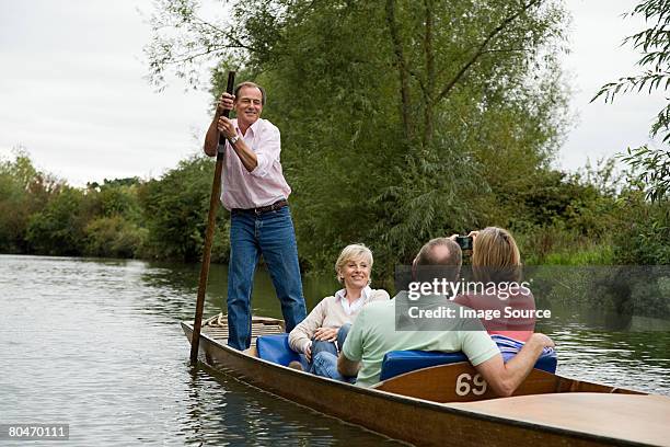 mature friends punting - punting stock pictures, royalty-free photos & images