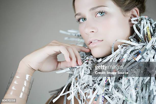 portrait of a woman wearing recycled accessories - shredded newspaper stock pictures, royalty-free photos & images