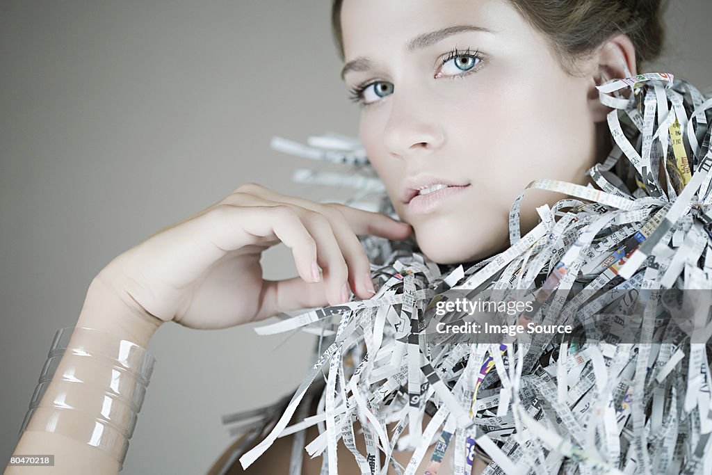 Portrait of a woman wearing recycled accessories