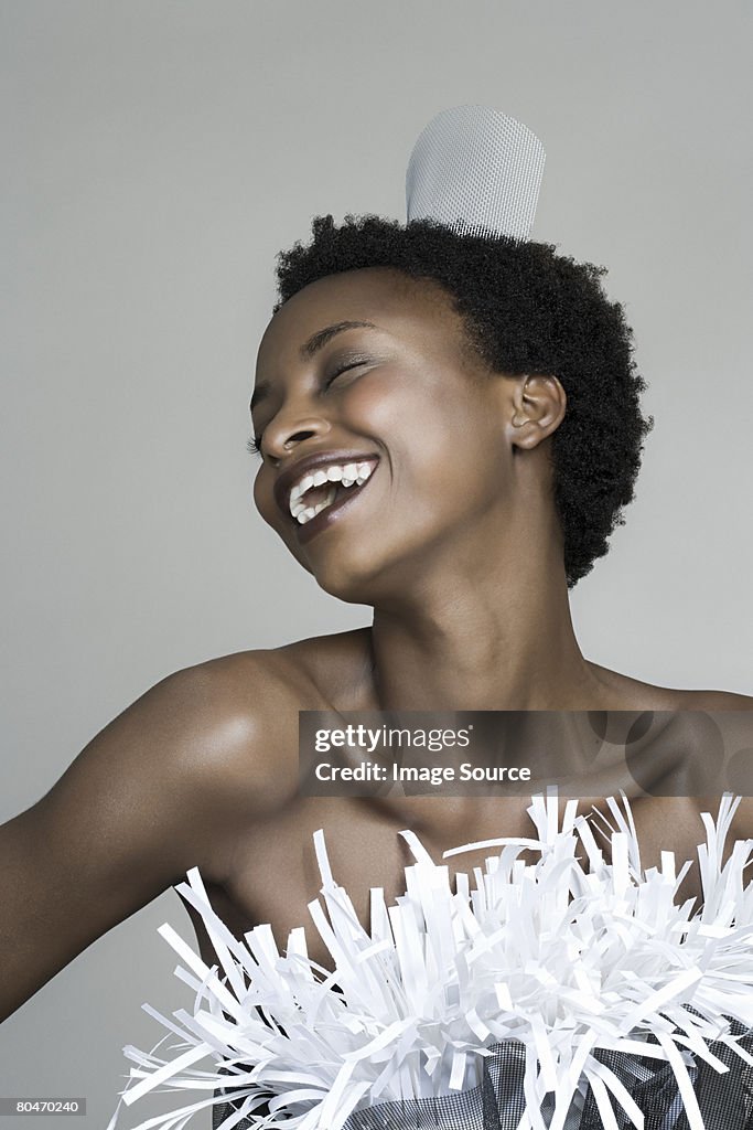 Portrait of a woman wearing recycled accessories