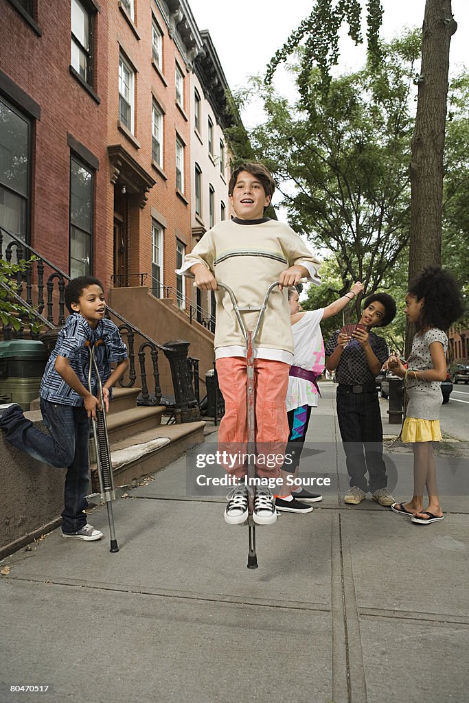 Boy on a pogo stick