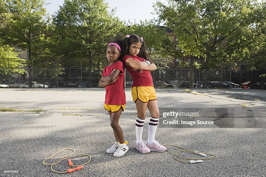 Girls with crossed arms