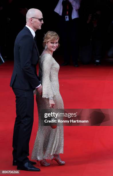 Actress Jitka Schneiderova and partner arrive at the opening ceremony of the 52st Karlovy Vary International Film Festival on June 30, 2017 in...