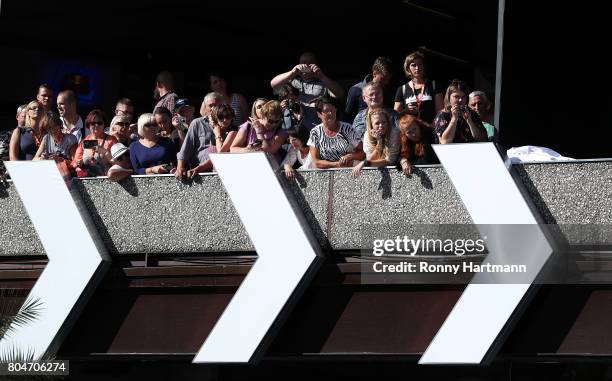 People wait for guests before the opening ceremony of the 52st Karlovy Vary International Film Festival on June 30, 2017 in Karlovy Vary, Czech...