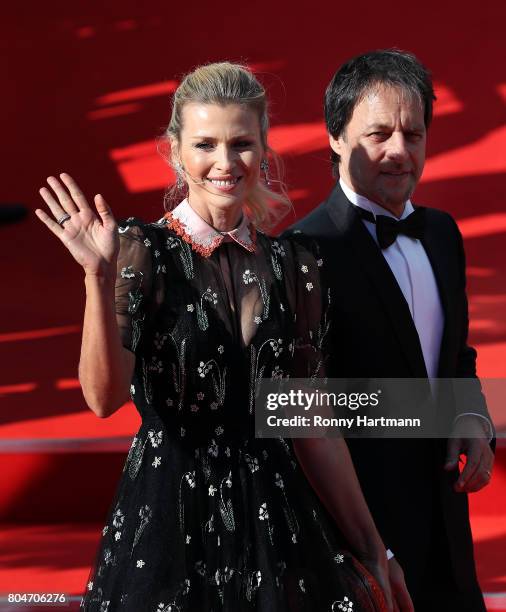 Model Daniela Pestova and her husband Pavol Habera arrive at the opening ceremony of the 52st Karlovy Vary International Film Festival on June 30,...