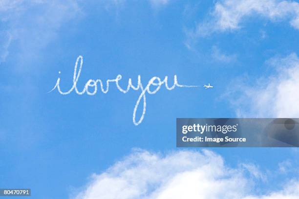 i love you written in vapour - skywriting stock pictures, royalty-free photos & images