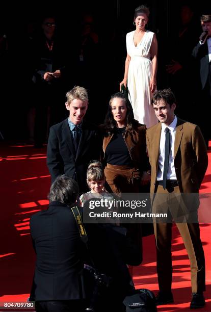 The family of Uma Thurman pose for photographers ahead to the opening ceremony of the 52st Karlovy Vary International Film Festival on June 30, 2017...