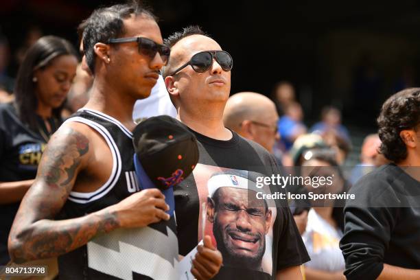 Fan with a crying Lebron James t-shirt looks on during JaVale McGees JUGLIFE charity softball game on June 24 at Oakland-Alameda County Coliseum in...