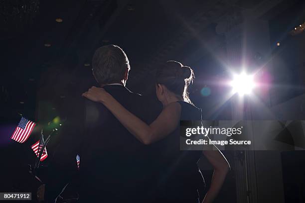 a politcian and his wife on at a political rally - politician back stock pictures, royalty-free photos & images