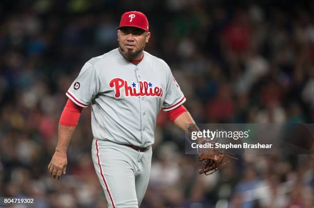 Relief pitcher Joaquin Benoit of the Philadelphia Phillies walks off the field after pitching in a an interleague game against the Seattle Marinersn...