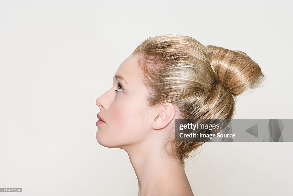 Profile of a woman with a hairstyle