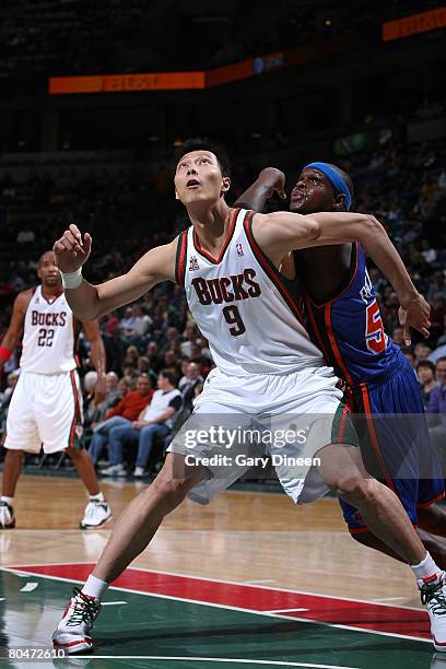 Yi Jianlian of the Milwaukee Bucks boxes out Zach Randolph of the New York Knicks on April 1, 2008 at the Bradley Center in Milwaukee, Wisconsin....