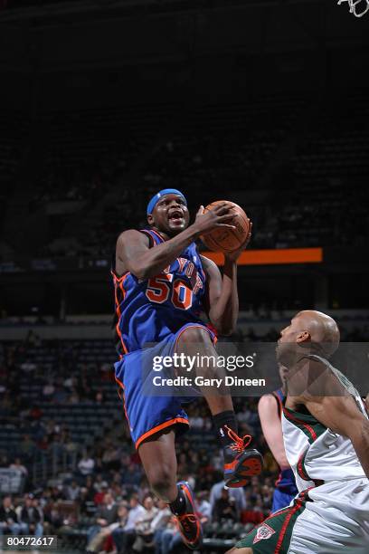 Zach Randolph of the New York Knicks drives to the basket against Michael Ruffin of the Milwaukee Bucks on April 1, 2008 at the Bradley Center in...