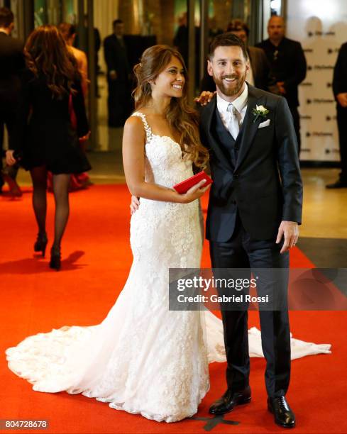 Lionel Messi and Antonela Rocuzzo pose for pictures during Lionel Messi and Antonela Rocuzzo's Wedding at City Center Hotel on June 30, 2017 in...