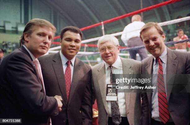 Businessman Donald Trump with Boxer Muhammad Ali and Governor Thomas H. Kean at Tyson vs Holmes Convention Hall in Atlantic City, New Jersey January...