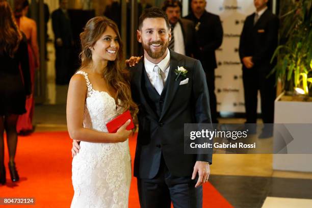 Lionel Messi and Antonela Rocuzzo pose for pictures during Lionel Messi and Antonela Rocuzzo's Wedding at City Center Hotel on June 30, 2017 in...