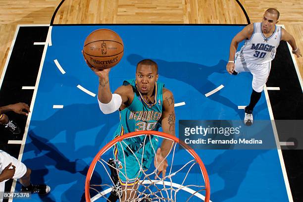David West of the New Orleans Hornets shoots against the Orlando Magic at Amway Arena on April 1, 2008 in Orlando, Florida. NOTE TO USER: User...