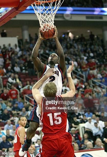 Jeremy Pargo of the Gonzaga Bulldogs puts the ball up against Thomas Sander of the Davidson Wildcats during the 1st round of the 2008 NCAA Men's...