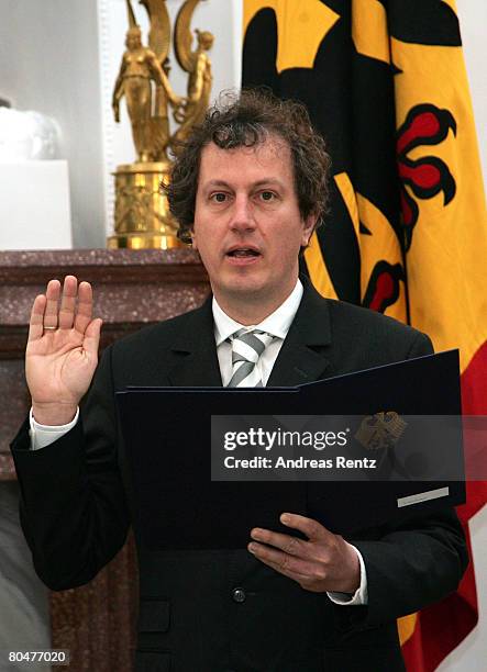 New Federal Constitutional Court judge Johannes Masing is sworn in by German President Koehler during an official handing over ceremony at Bellevue...