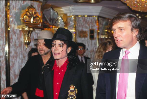 Businessman Donald Trump and pop star Michael Jackson at the opening of the Taj Mahal Casino Hotel in Atlantic City, New Jersey April 2 1990.