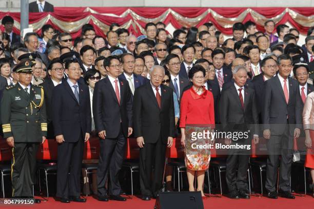 Zhang Xiaoming, director of the Liaison Office of the Central People's Government in Hong Kong, from front row third left, Tung Chee-Hwa, Hong Kong's...