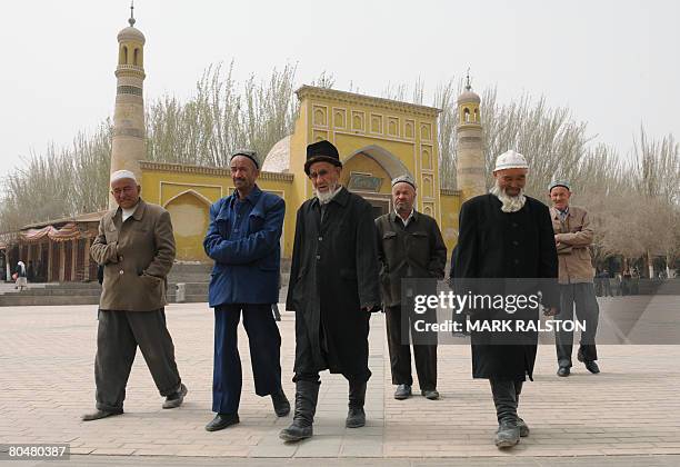 Chinese Muslim Uighurs leave a mosque in the town of Kashgar, Xinjiang Province on April 2, 2008. China has accused Muslims in the nation's northwest...