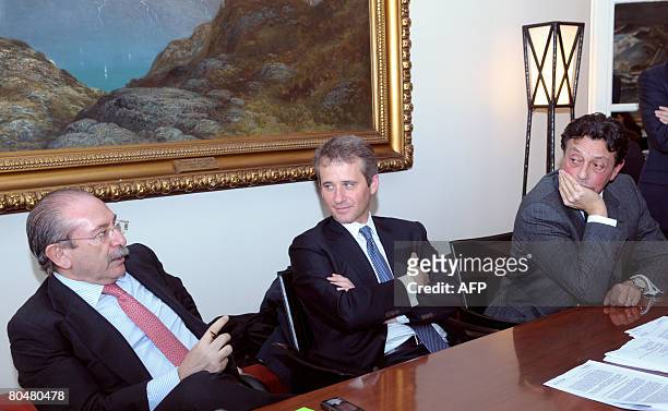 Spanish construction group Sacyr Vallehermoso chief Luis Del Rivero speaks as his lawyers Jean-Michel Darroi and Herve Pisani listens during a press...