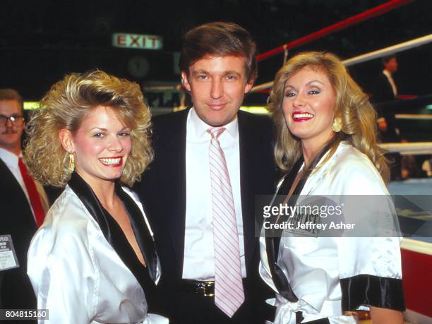 Businessman Donald Trump with round girls ringside at Tyson vs Spinks Convention Hall in Atlantic City, New Jersey June 27 1988.