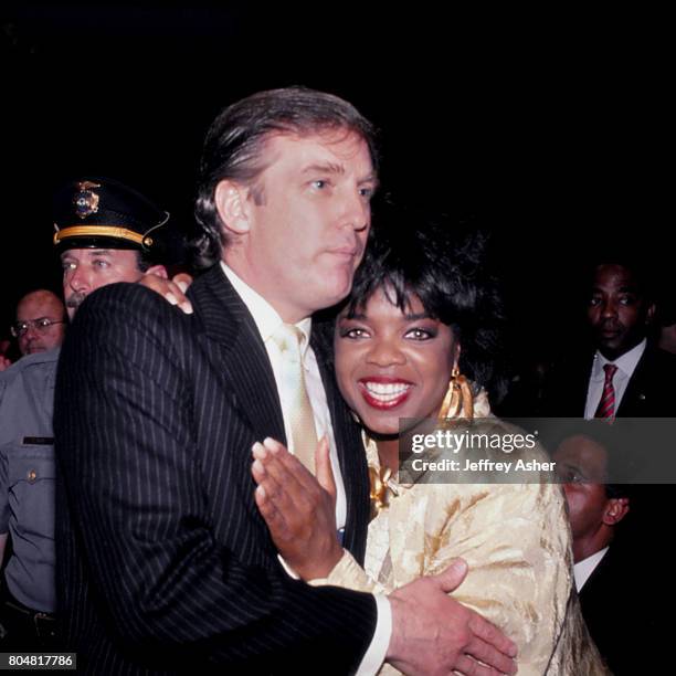Businessman Donald Trump and Oprah Winfrey ringside at Tyson vs Holmes Convention Hall in Atlantic City, New Jersey January 22 1988.