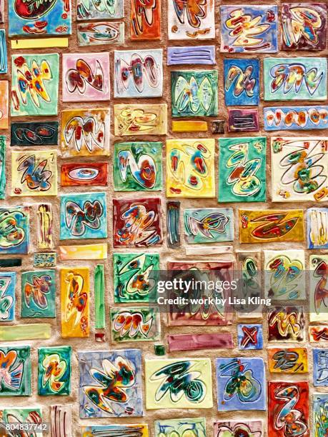 exterior building wall of colorful ceramic tiles. - paducah kentucky stock pictures, royalty-free photos & images