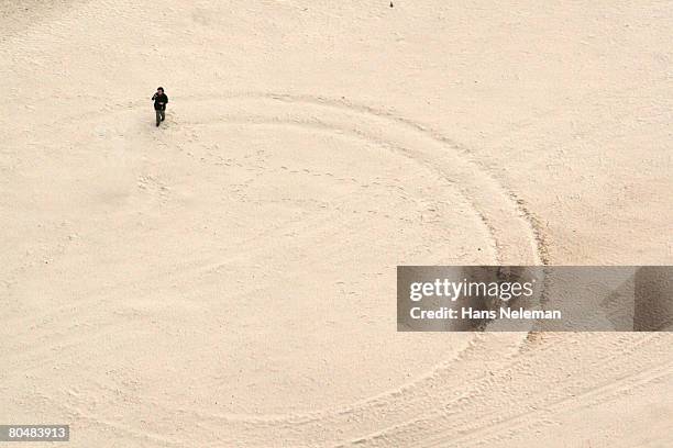 man walking on sand, elevated view - alonissos stock pictures, royalty-free photos & images