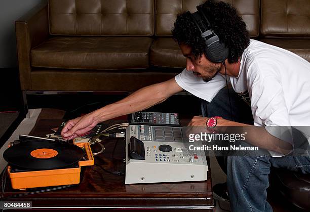 dj playing record - dj table stock pictures, royalty-free photos & images
