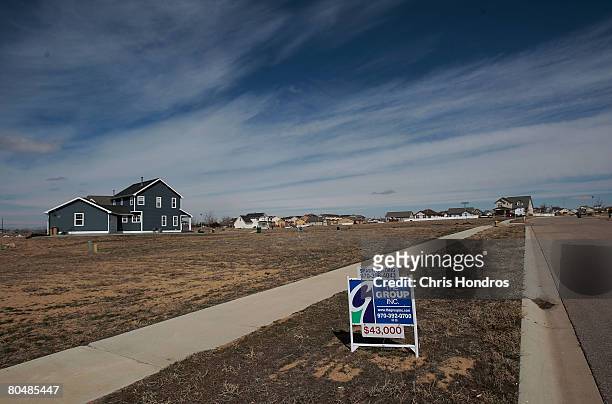Homes, some occupied, sit amidst empty unsold land in a recently-built housing development April 1, 2008 in Greeley, Colorado. Greeley and...