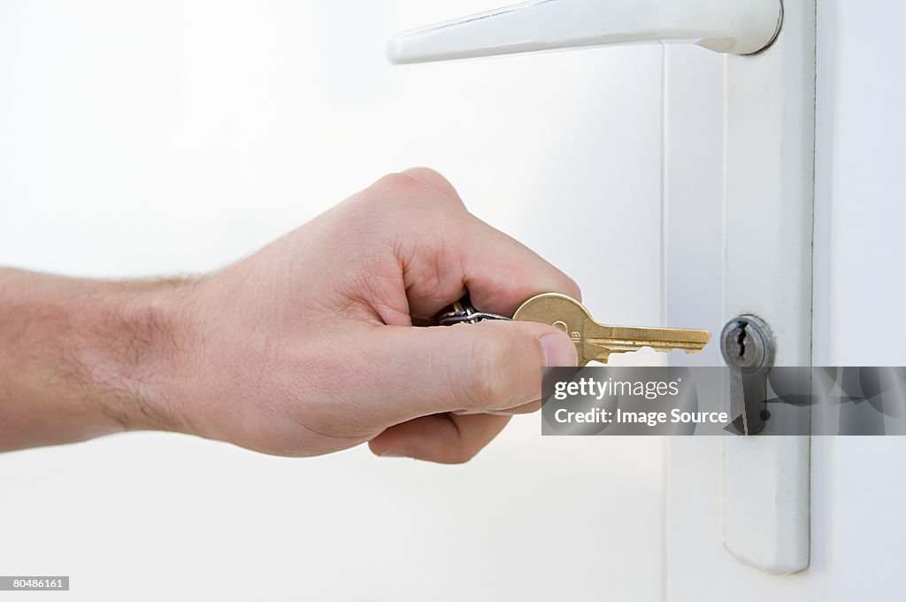 Door and person with key