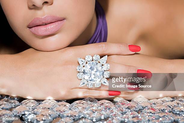 woman with a large diamond ring - diamond gemstone stock pictures, royalty-free photos & images