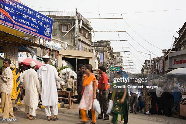 people walking through a market - maharashtra stock pictures, royalty-free photos & images