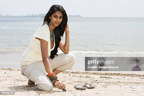 a young woman on mumbai beach - maharashtra day stock pictures, royalty-free photos & images