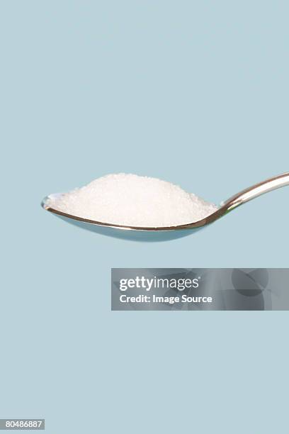 spoonful of sugar - sugar spoon stock pictures, royalty-free photos & images