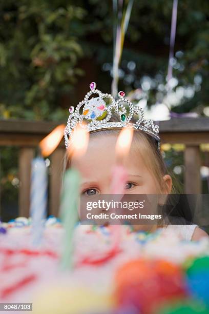 girl and birthday candles - birthday tiara stock pictures, royalty-free photos & images