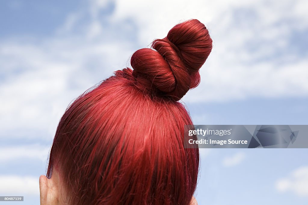 Woman with dyed red hair