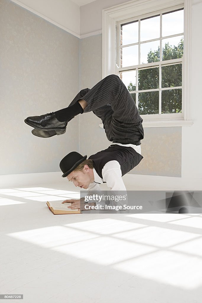 Contortionist Reading A Book High-Res Stock Photo - Getty Images