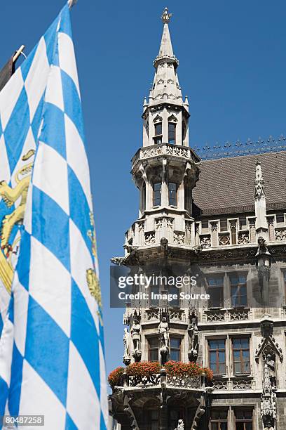 bavarian flag and munich town hall - bavaria flag stock pictures, royalty-free photos & images