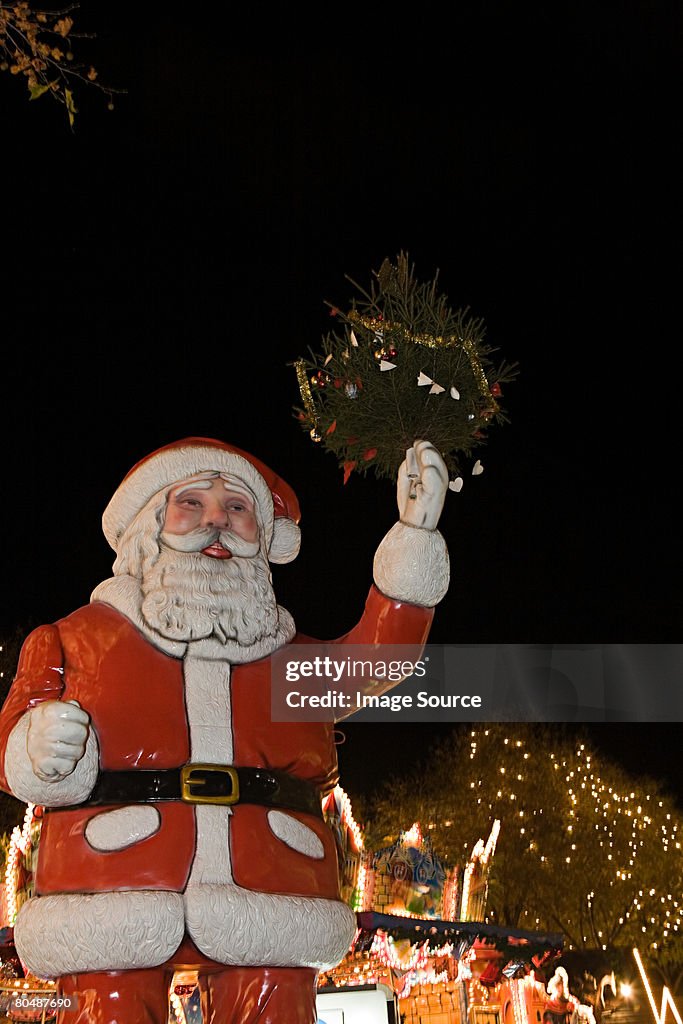 A statue of father christmas