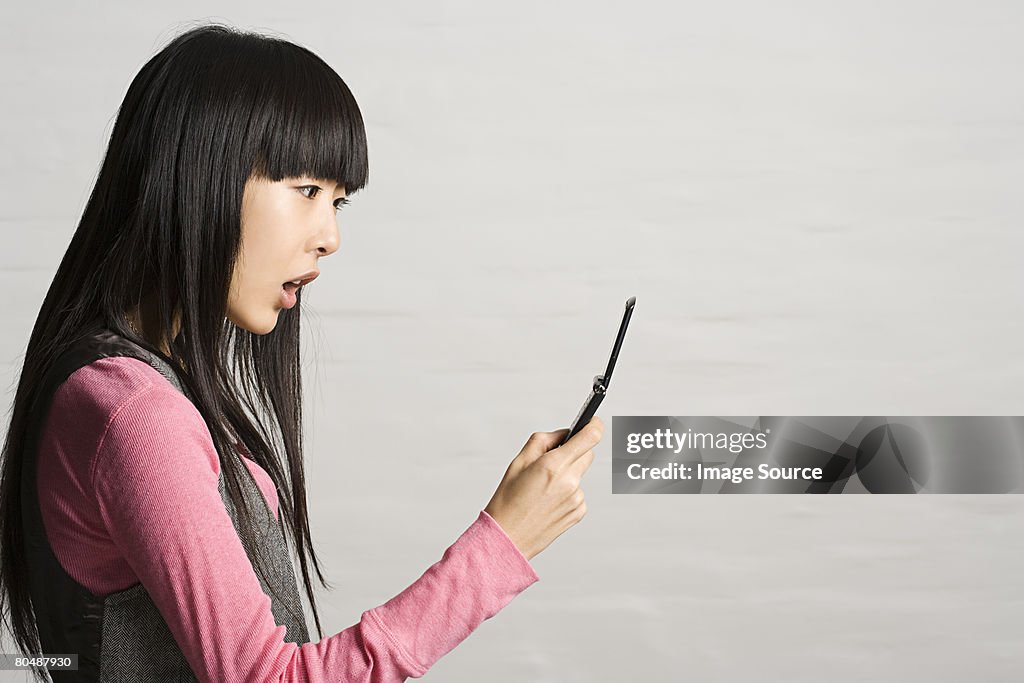 Young woman with cellphone