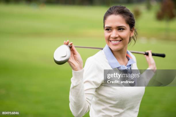 portret van een vrouwelijke golfer - female golf stockfoto's en -beelden