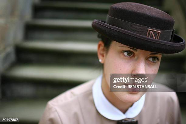 Stephanie Clark, a student at Norland College, is pictured at the college in Bath, in south-west England, March 13, 2008. Immaculately dressed,...