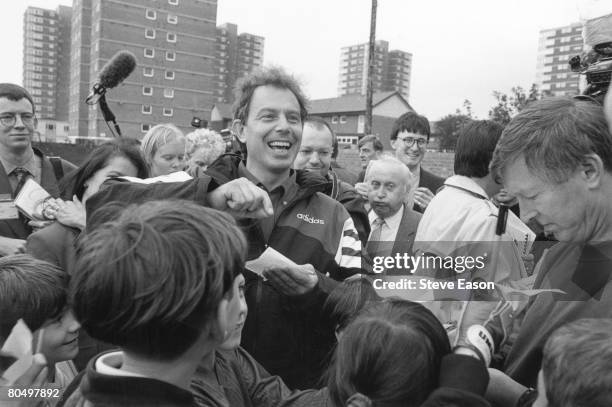 Leader of the Labour Party Tony Blair MP visits Devonshire Primary School in Blackpool with Alex Ferguson, manager of Manchester United Football...